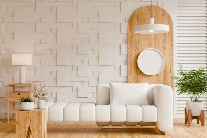 Un salon moderne avec un canapé blanc design mettant en valeur une décoration contemporaine et chaleureuse.